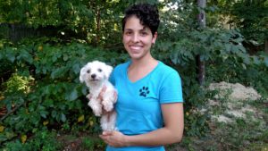 Adriana with her adopted Maltese, Rosie.