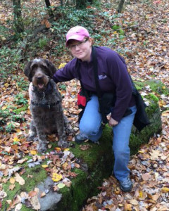 Dina with her student dog, Mavor, enjoying some outdoor training time.