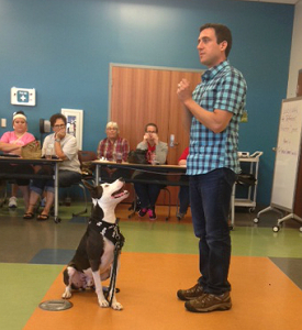 CATCH Director, David Muriello, teaching at one of Petfinder/Petco Foundation's national education events for shelter workers. This is a training demonstration of Sit-with-Auto-Hold, starring Cosmo, an attentive shelter dog. Notice how he stays seated even without a command. Good boy!