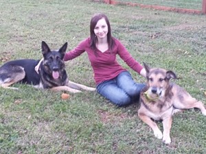 Leighton with her two German Shepherds, Copper and Kenai.